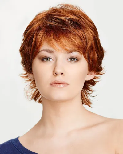 Try on this stylish short red hairstyle with layered bangs framing the face.