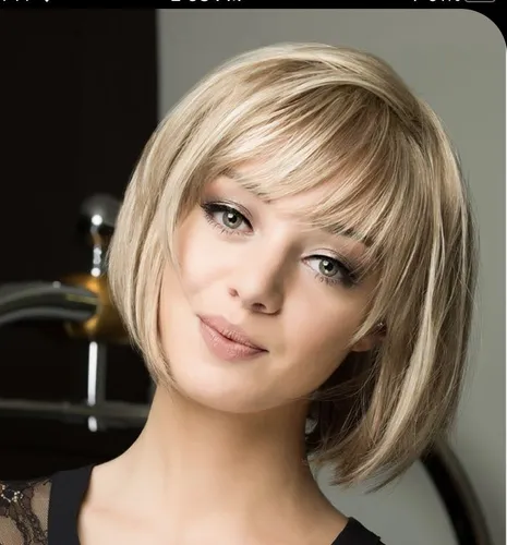 Try on this sleek bob cut with blonde highlights. The hairstyle features a neatly trimmed bob length just above the shoulders with subtle bangs softly framing the face.