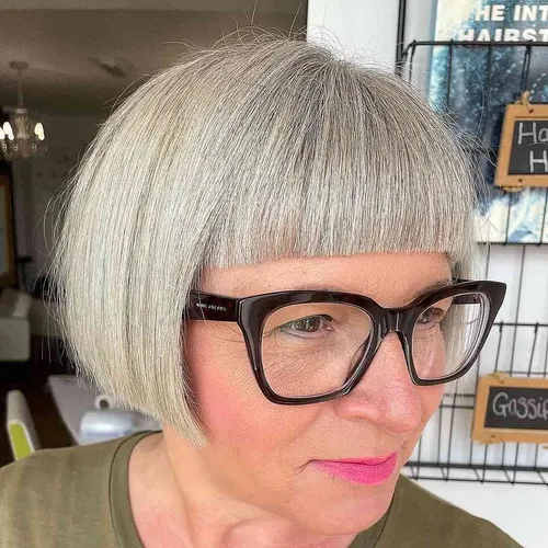 try on this stylish bob cut with neat bangs, featuring a flawless silver hue