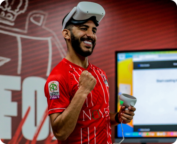 Haytham El Bahja of Fath Union Sport Rabat (FUS Rabat) smiling and clenching his fist after training with Be Your Best on a VR headset